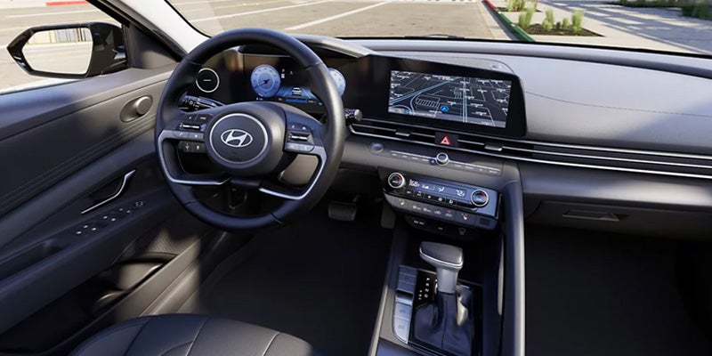 Interior view of a Hyundai Elantra featuring the steering wheel